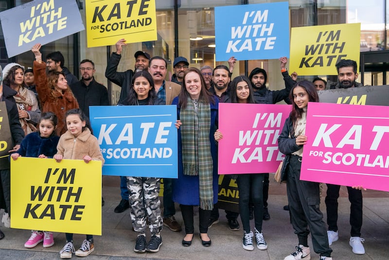 Ms Forbes joins supporters holding signs at the University of Strathclyde in Glasgow. Getty