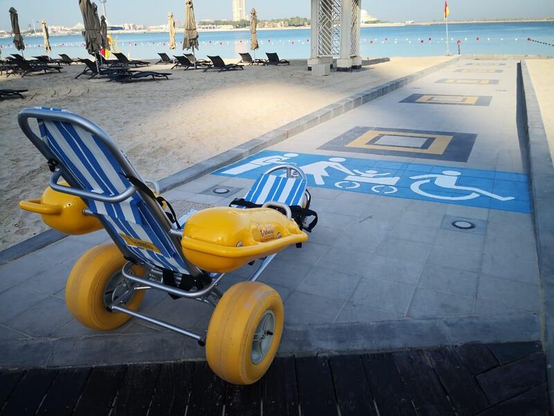 A water bike is parked in the new lane created for people with disabilities, families with prams, and the elderly at one of Abu Dhabi's beaches. Courtesy Abu Dhabi Municipality