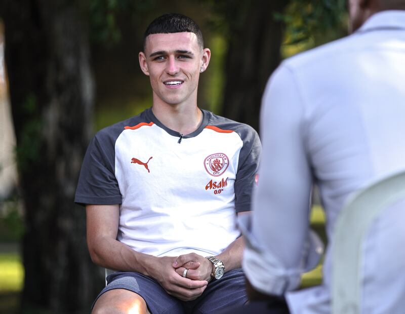 Manchester City attacker Phil Foden of speaks to the media at the Emirates Palace.