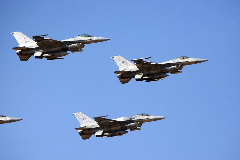 UAE F-16s fly in formation over Al Ain. The nation is buying 30 more of the fighter jets from Lockheed Martin. Sammy Dallal / The National


