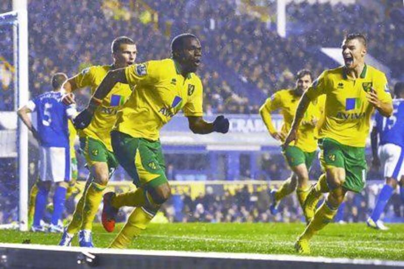 Norwich City's Sebastien Bassong, third left, celebrates his 90th-minute goal against Everton to earn a share of the points. Nigel Roddis / Reuters