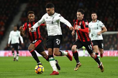 BOURNEMOUTH, ENGLAND - DECEMBER 17:  Alex Oxlade-Chamberlain of Liverpool runs with the ball during the Premier League match between AFC Bournemouth and Liverpool at Vitality Stadium on December 17, 2017 in Bournemouth, England.  (Photo by Bryn Lennon/Getty Images)