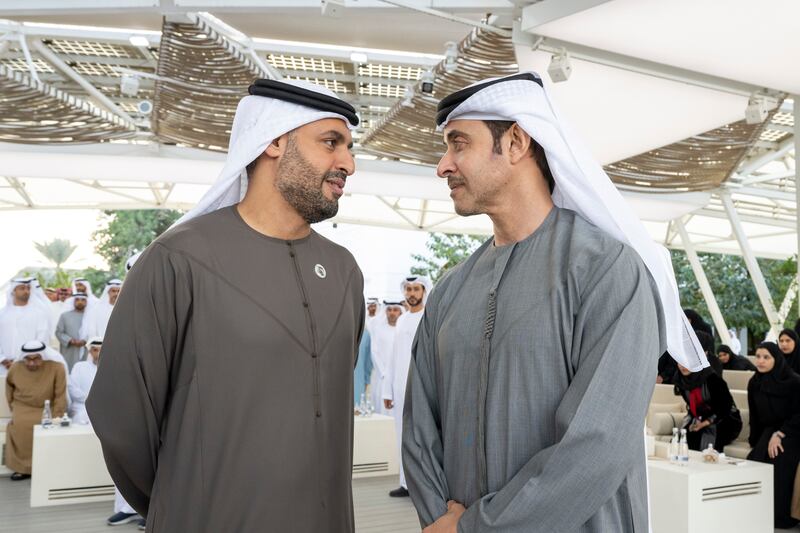 Sheikh Hazza bin Zayed, vice chairman of the Abu Dhabi Executive Council, right, speaks with Sheikh Mohamed bin Hamad, adviser for Private Affairs at the Presidential Court 