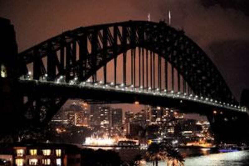 The Sydney Harbour Bridge, with lights off as part of Earth Hour.