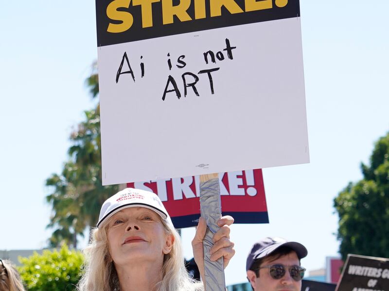 Actress Frances Fisher joins the picket line outside Paramount studios in Los Angeles. AP