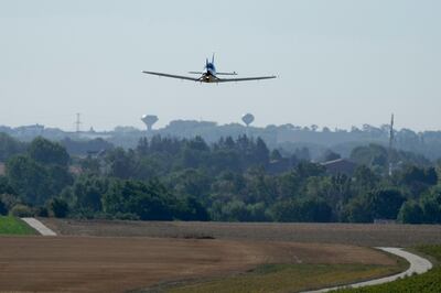 Mack Rutherford approaches to land at Buzet airfield in Pont-a-Celles, in Belgium. AP