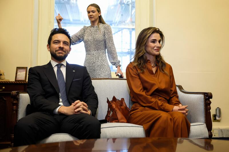 Prince Hussein and Queen Rania attend a meeting. Getty / AFP