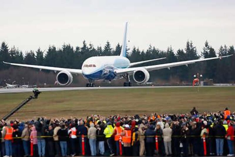 Boeing's 787 Dreamliner taxies down the runway before its maiden flight last year.