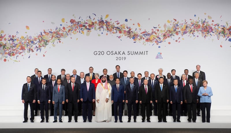 Leaders pose for the family photo at the G20 Summit. AP