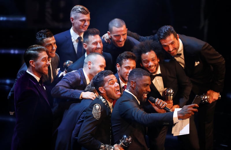 Actor Idris Elba poses for a selfie with Fifa FIFPro World 11 players Neymar of PSG, Real Madrid’s Cristiano Ronaldo, Barcelona’s Lionel Messi, Barcelona’s Andres Iniesta, Real Madrid’s Luka Modric, Real Madrid’s Toni Kroos, Paris Saint-Germain’s Dani Alves, Real Madrid’s Sergio Ramos, AC Milan's Leonardo Bonucci, Real Madrid’s Marcelo and Juventus’ Gianluigi Buffon during the awards. John Sibley / Reuters