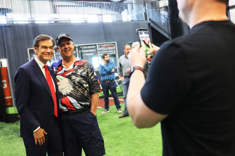 Pennsylvania US  Senate candidate Dr Mehmet Oz poses for photos at a Republican leadership forum at Newtown Athletic Club on May 11, 2022 in Newtown, Pennsylvania. AFP