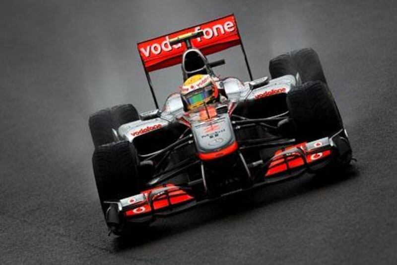 SAO PAULO, BRAZIL - NOVEMBER 06: Lewis Hamilton of Great Britain and McLaren Mercedes drives during qualifying for the Brazilian Formula One Grand Prix at the Interlagos Circuit on November 6, 2010 in Sao Paulo, Brazil.  (Photo by Vladimir Rys/Getty Images)