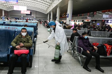 A worker disinfects a railway station in Nanchang City, Jiangxi province, China, 22 January 2020. The outbreak of coronavirus has so far claimed 17 lives and infected more than 550 people.