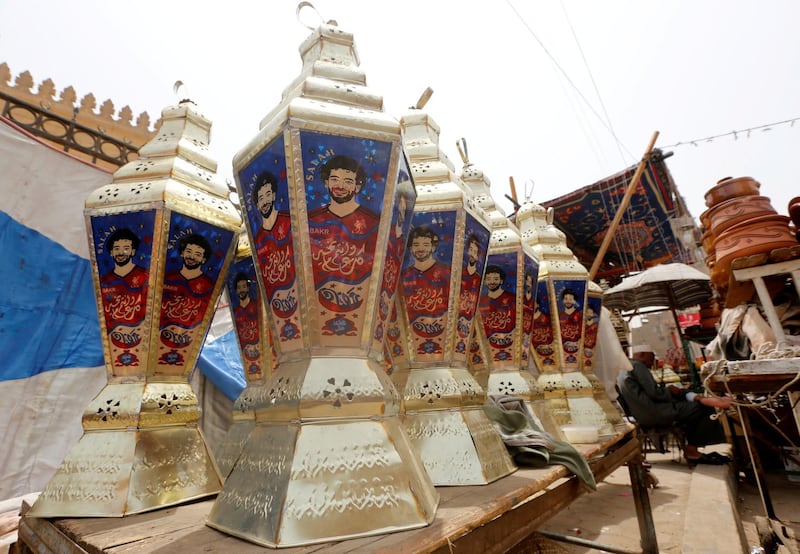 Traditional decorative lanterns known as 'Fanous' bearing the image of Mohamed Salah, are seen at a market, before the beginning of the holy fasting month of Ramadan in Cairo, Egypt. Arabic words read 'Ramadan is sweeter with Salah'. Amr Abdallah Dalsh / Reuters