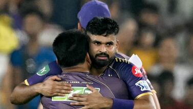 Kolkata Knight Riders' captain Shreyas Iyer (R) hugs head coach Chandrakant Pandit as they celebrate after their team's win against Sunrisers Hyderabad at the Indian Premier League (IPL) Twenty20 first qualifier cricket match in the Narendra Modi Stadium of Ahmedabad on May 21, 2024.  (Photo by Punit PARANJPE  /  AFP)  /  -- IMAGE RESTRICTED TO EDITORIAL USE - STRICTLY NO COMMERCIAL USE --