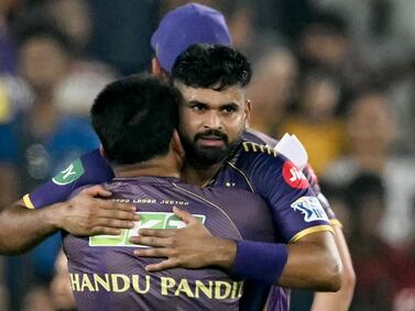 Kolkata Knight Riders' captain Shreyas Iyer (R) hugs head coach Chandrakant Pandit as they celebrate after their team's win against Sunrisers Hyderabad at the Indian Premier League (IPL) Twenty20 first qualifier cricket match in the Narendra Modi Stadium of Ahmedabad on May 21, 2024.  (Photo by Punit PARANJPE  /  AFP)  /  -- IMAGE RESTRICTED TO EDITORIAL USE - STRICTLY NO COMMERCIAL USE --