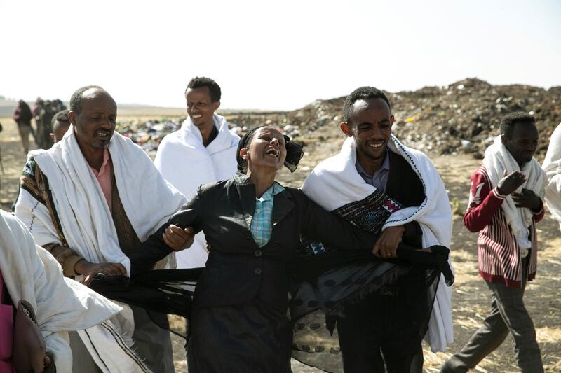 Kebebew Legesse, the mother of Ethiopian Airlines cabin crew Ayantu Girmay mourns at the scene of the Ethiopian Airlines Flight ET 302 plane crash. Reuters