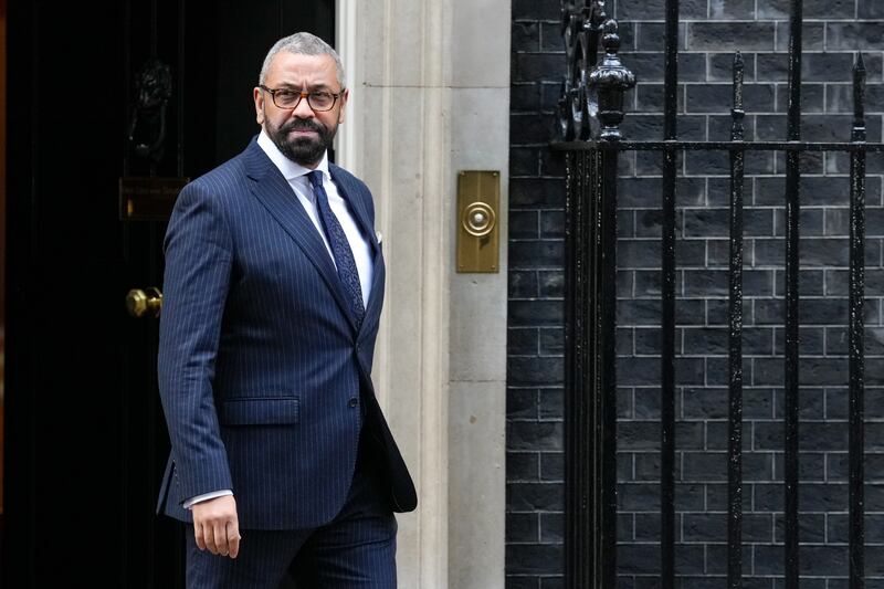 Newly appointed Home Secretary James Cleverly leaves Downing Street on Monday morning. PA