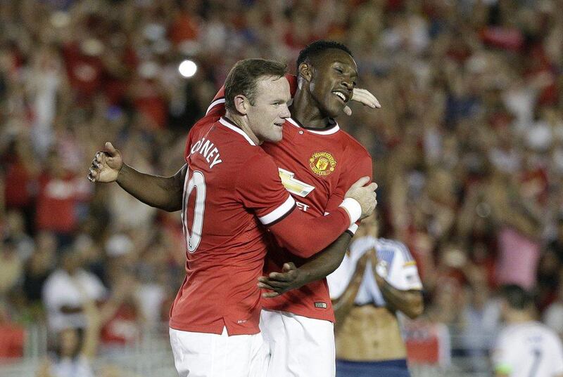 Wayne Rooney celebrates with Danny Welbeck after scoring a goal during Manchester United's 7-0 win over LA Galaxy on Wednesday night in Pasadena, California. AP Photo / July 23, 2014