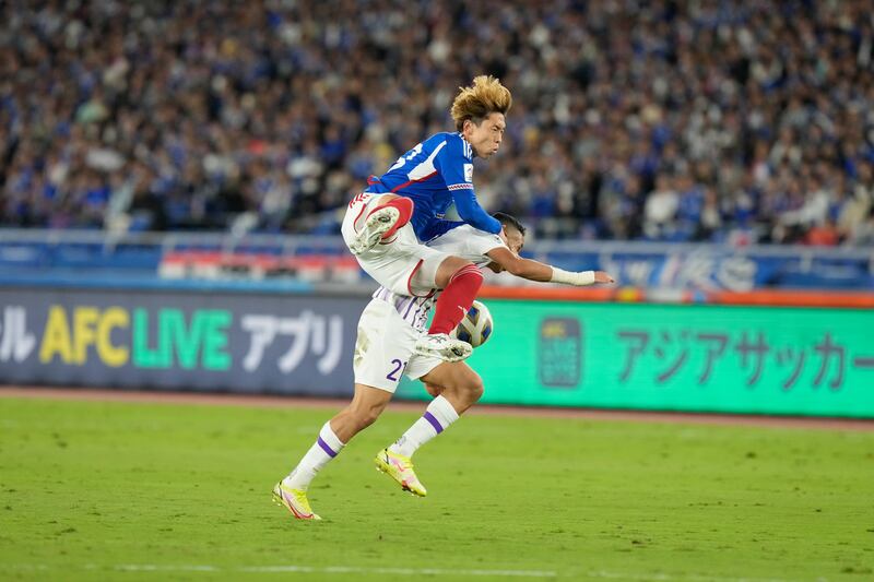 Yokohama F Marinos' Taiki Watanabe and Al Ain's Soufiane Rahimi battle. AP 