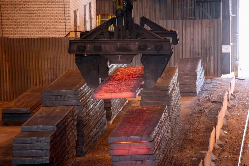 Slabs of steel are moved the Metinvest Ilyich Iron and Steel Works in Mariupol, a major port with mines and steel works that account for a significant part of the Ukraine's industrial output. John Moore / Getty Images