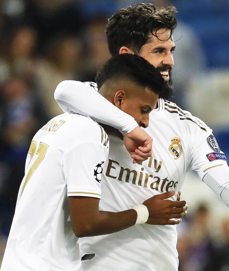 Real Madrid's new teenage sensation Rodrygo celebrates with teammate Isco after his third goal. EPA