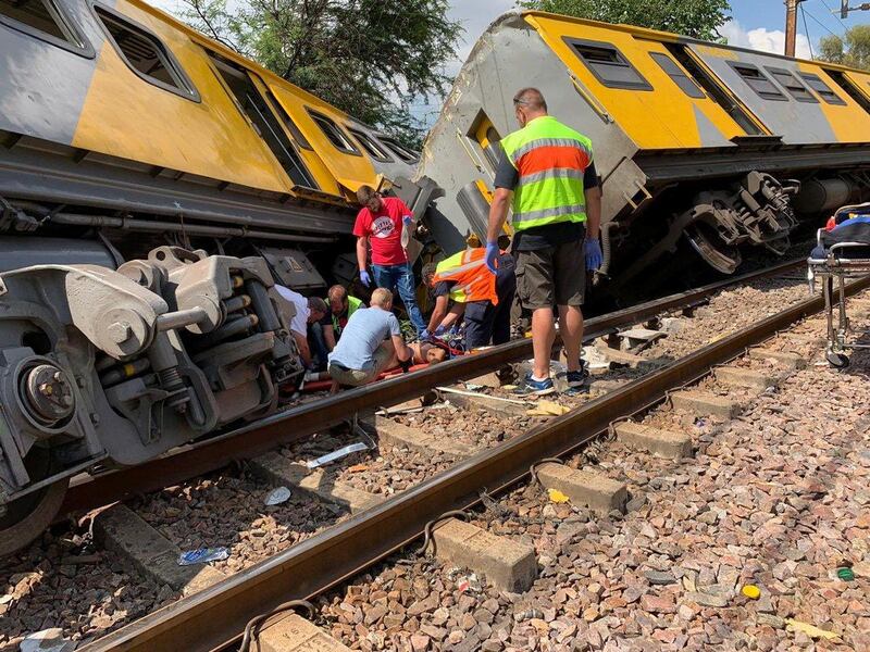 ATTENTION EDITORS - VISUAL COVERAGE OF SCENES OF INJURY OR DEATH Emergency services are seen at the site of a train crash in Pretoria, South Africa January 8, 2019 in this picture obtained from social media. TWITTER/@ABRAMJEE/via REUTERS THIS IMAGE HAS BEEN SUPPLIED BY A THIRD PARTY. MANDATORY CREDIT. NO RESALES. NO ARCHIVES.