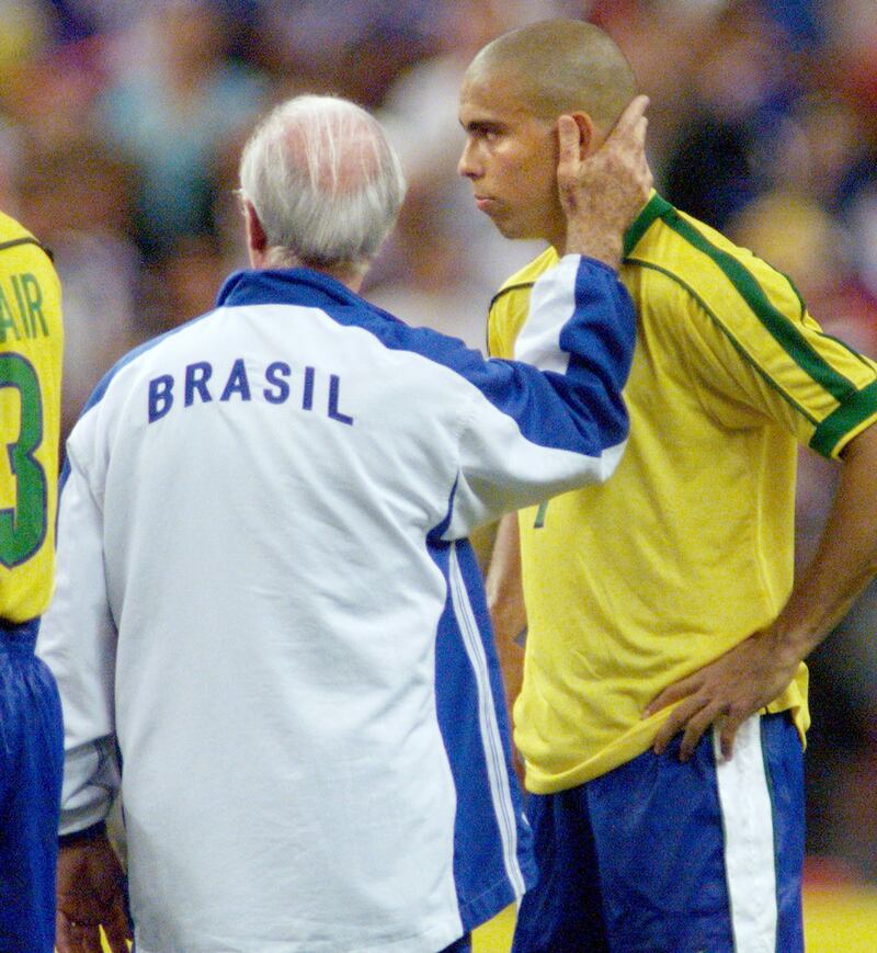 Brazilian coach Mario Zagallo comforts striker Ronaldo at the Stade de France in Saint-Denis, near Paris, after France defeated Brazil in the 1998  World Cup final. AFP