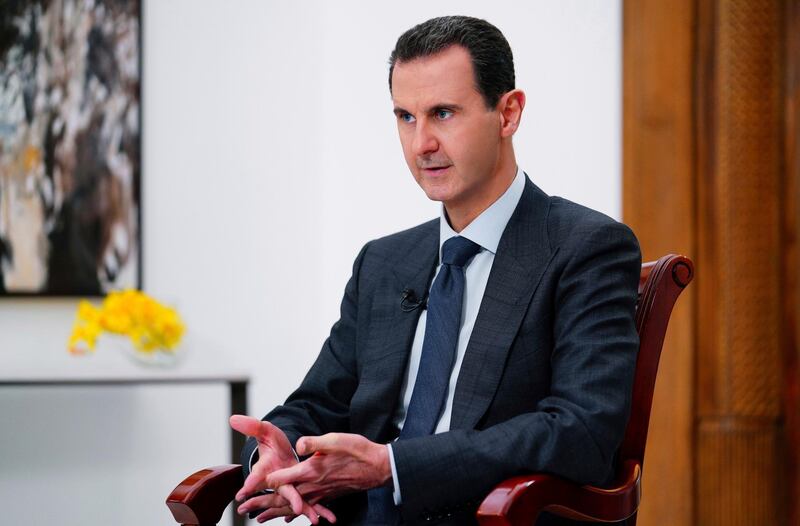 FILE - In this file photo released Monday Nov. 9, 2019 by the Syrian official news agency SANA, Syrian President Bashar Assad speaks in Damascus, Syria.  The global chemical weapons watchdog issued a report Wednesday 'April 8, 2020, blaming the Syrian air force for a series of chemical attacks using sarin and chlorine in late March 2017 and OPCW Director-General Fernando Arias said it is now up to the organization, â€œthe United Nations Secretary-General, and the international community as a whole to take any further action they deem appropriate and necessary.â€(SANA FILE via AP)
