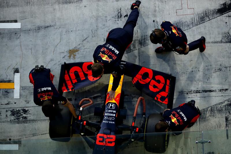 Red Bull's Alexander Albon is pushed back into the garage during qualifying. Getty Images