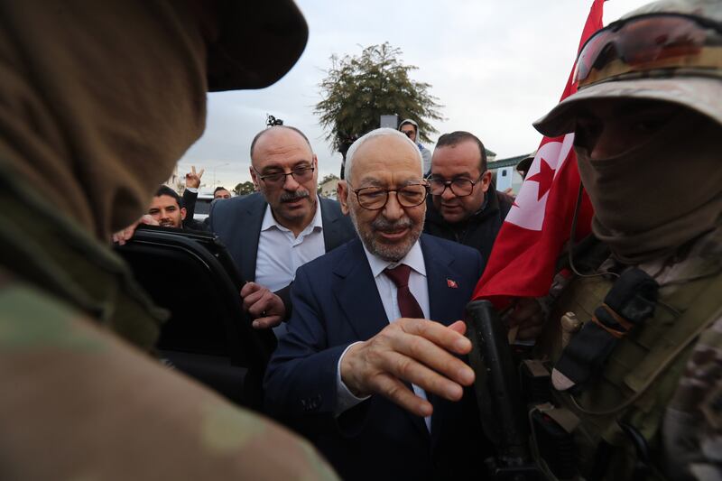 Rached Ghannouchi at the judicial police headquarters in Tunis in April last year. EPA