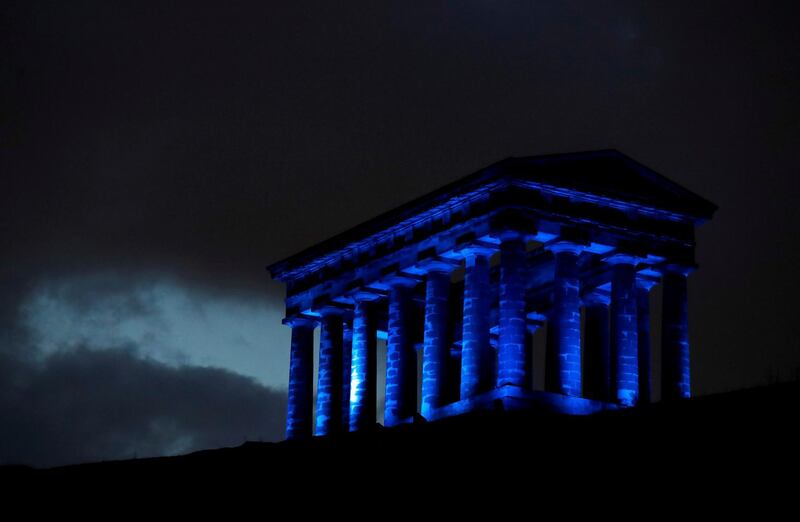 The Penshaw monument lights up blue in support of the NHS, as the spread of the coronavirus disease continues, in Sunderland, Britain. Reuters