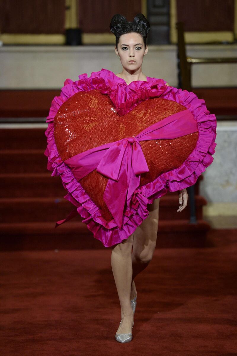A model walks at the Vaquera Runway during New York Fashion Week in an exaggerated heart design dress.  Getty Images