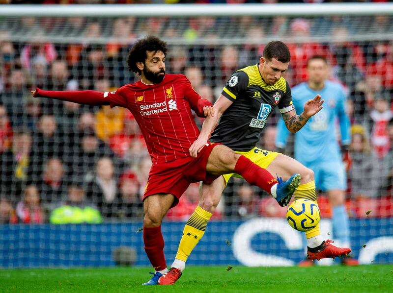 Liverpool's Mohamed Salah fights for the ball with Southampton's Pierre-Emile Hojbjerg. EPA