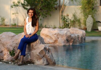 Pooja (pictured) and Sanjay Asarpota's back garden pool. Chris Whiteoak / The National