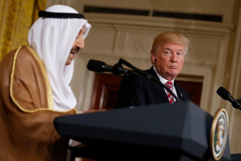 U.S. President Donald Trump (R) listens during a joint news conference with Emir of Kuwait Sabah Al-Ahmad Al-Jaber Al-Sabah in the East Room of the White House in Washington, U.S., September 7, 2017. REUTERS/Jonathan Ernst