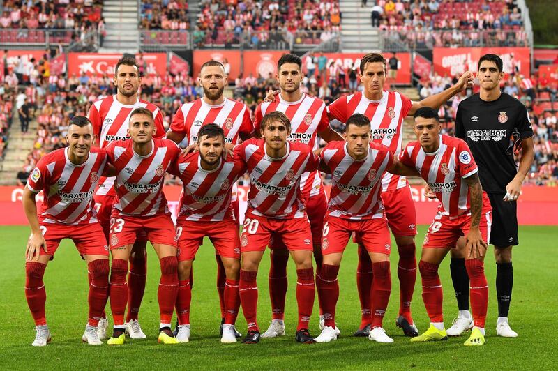 GIRONA, SPAIN - AUGUST 17:  Girona FC players pose for a team picture during the La Liga match between Girona FC and Real Valladolid CF at Montilivi Stadium on August 17, 2018 in Girona, Spain.  (Photo by David Ramos/Getty Images)
