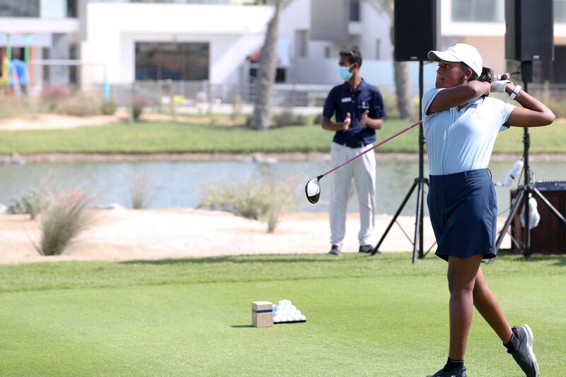Rising junior star Maya Gaudin took an inaugural drive at Yas Acres Golf & Country Club in Abu Dhabi. All photos: Khushnum Bhandari / The National