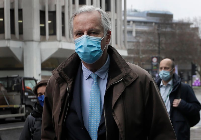 European Commission's Head of Task Force for Relations with the United Kingdom Michel Barnier wears a face mask to curb the spread of COVID-19 as he arrives at the Conference Centre in London, Friday, Dec. 4, 2020. With less than one month to go before the U.K. exits the EU's economic orbit, talks are continuing, and U.K. officials have said this is the last week to strike a deal. (AP Photo/Kirsty Wigglesworth)