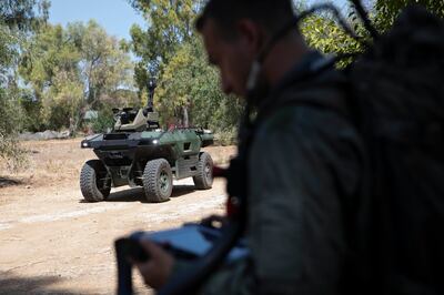 Israel's new semi-autonomous four-wheel-drive patrol vehicle can be controlled from a tablet. AP Photo