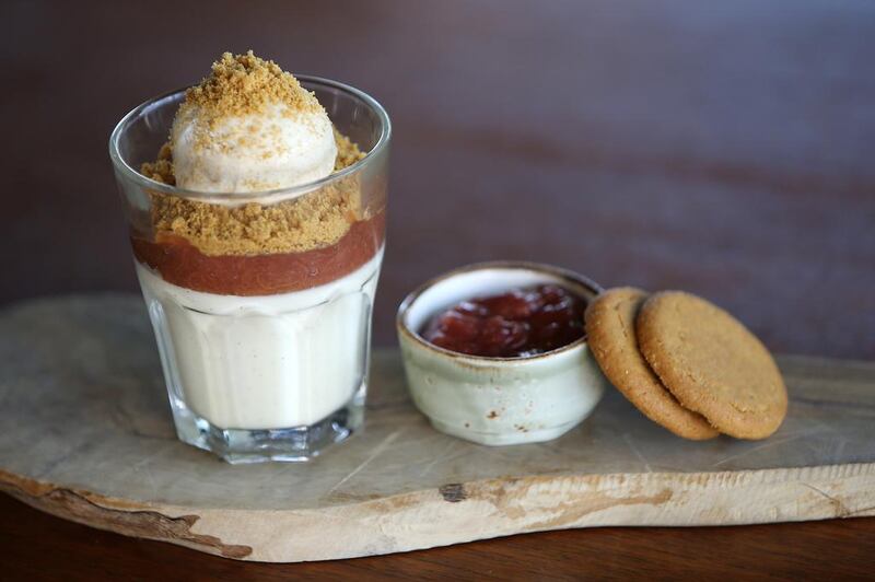 Rhubarb and custard buttermilk pudding with gingernut ice cream. Pawan Singh / The National
