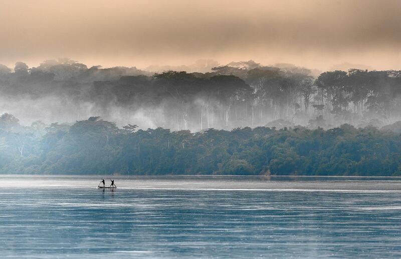 Morning fog on the Congo River. Flydubai