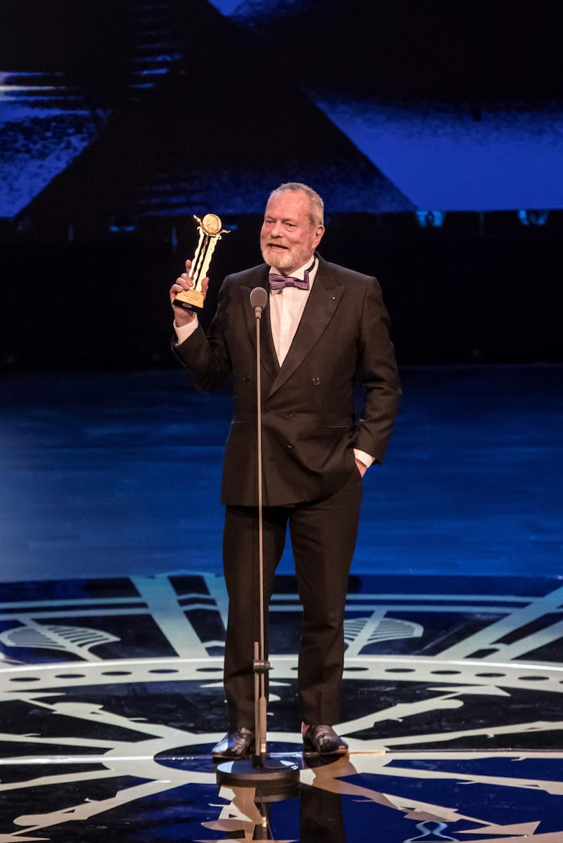 Terry Gilliam receives a Lifetime Achievement Award during the opening ceremony of the 41st edition of Cairo International Film Festival in Egypt on November 20, 2019. AFP