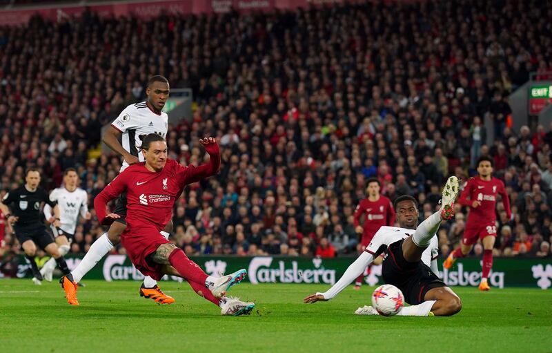 Fulham’s Tosin Adarabioyo attempts a block as Liverpool's Darwin Nunez shoots. PA 