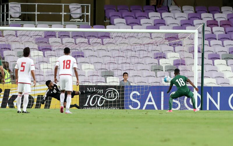 Al Ain, United Arab Emirates - August 29th, 2017: Saudi's Nawaf Alabid scores from a penalty during the World Cup qualifying game between UAE v Saudi Arabia. Tuesday, August 29th, 2017 at Hazza Bin Zayed Stadium, Al Ain. Chris Whiteoak / The National