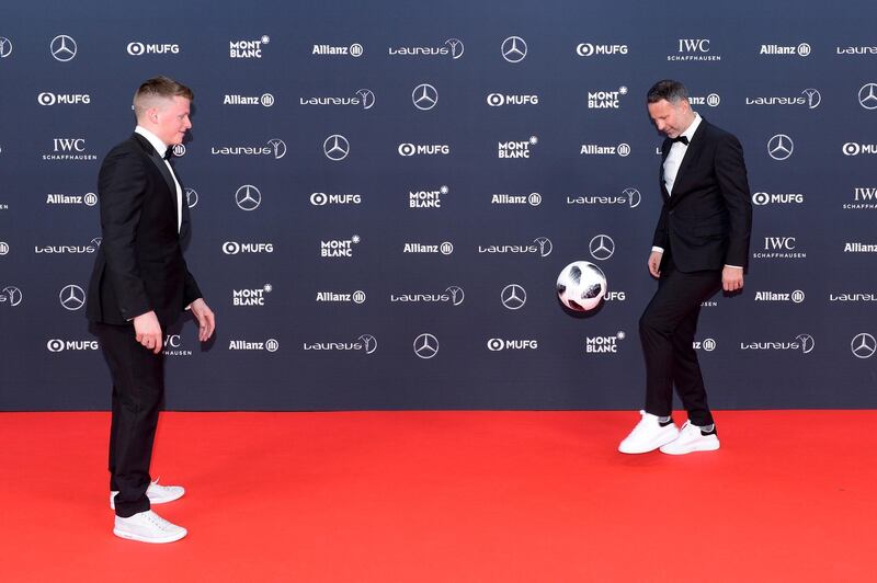 MONACO - FEBRUARY 27: Footballer Ryan Giggs (R) and guest attend the 2018 Laureus World Sports Awards at Salle des Etoiles, Sporting Monte-Carlo on February 27, 2018 in Monaco, Monaco.  (Photo by Christian Alminana/Getty Images for Laureus)