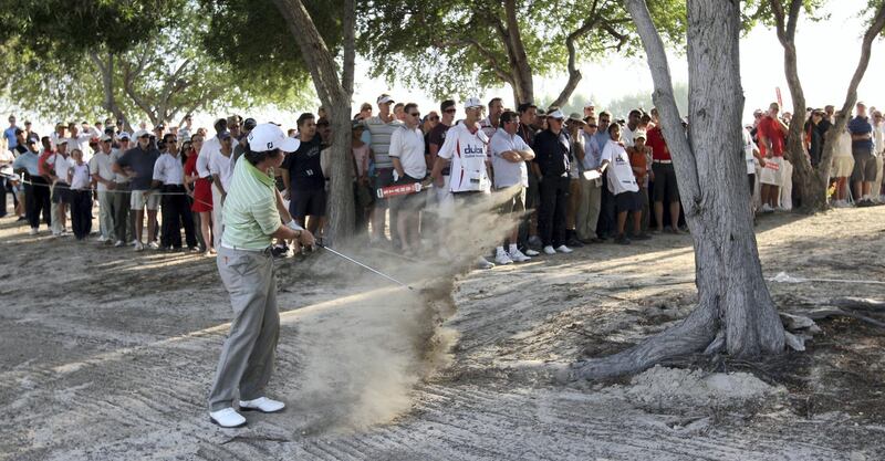 DUBAI, UNITED ARAB EMIRATES - FEBRUARY 01:  Rory McIlroy of Northern Ireland plays his second shot on the 16th hole during the of final round of the Dubai Desert Classic played on the Majlis Course on February 1, 2009 in Dubai,United Arab Emirates.  (Photo by Ross Kinnaird/Getty Images)