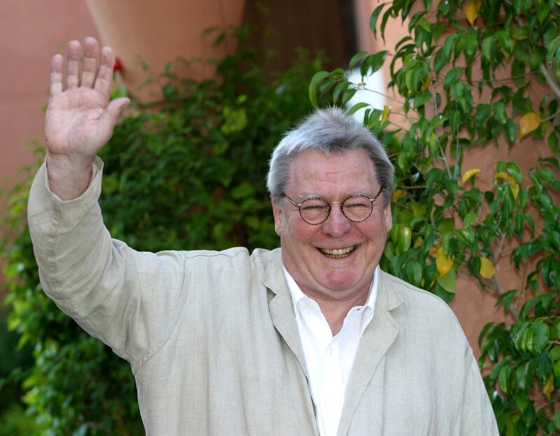 British director and president of the jury Sir Alan Parker smiles during the opening of the 4th Marrakesh International Film Festival on December 6, 2004 in Marrakesh. Reuters