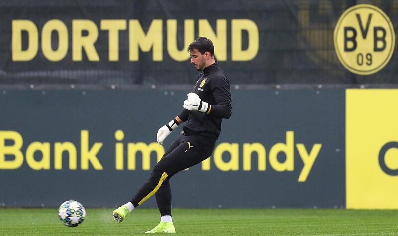 Dortmund goalkeeper Roman Buerki passes the ball. EPA