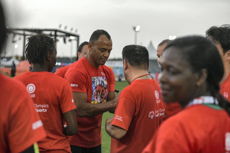 Abu Dhabi, United Arab Emirates - Marcos Evangelista de Morais known as Cafu signs t-shirts of his fans at the Unified Sports Experience at Zayed Sports City. Khushnum Bhandari for The National
